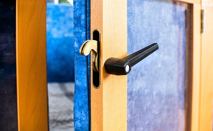 Robust middle locks keep closed doors secure.