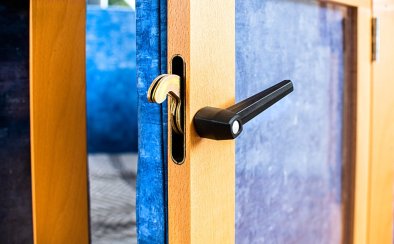 Robust middle locks keep closed doors secure.